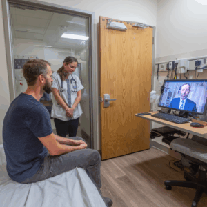Patient speaking to doctor on video.
