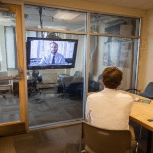 A student in office on telemedicine session.