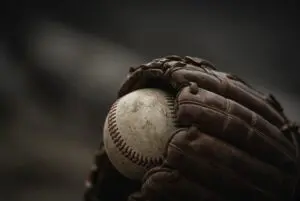 A baseball in a glove.