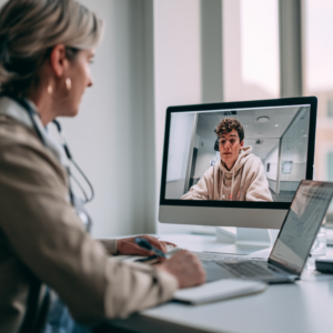 Telemedicine visit between a nurse a patient.
