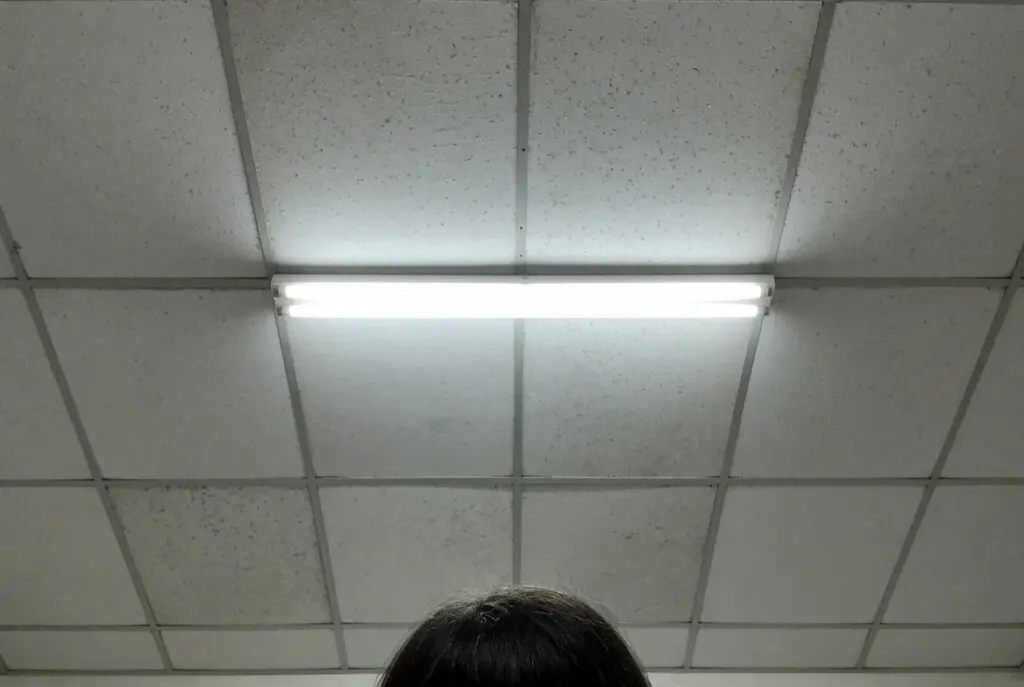 Telepsychiatry camera aimed too high, showing ceiling tile instead of the patient’s face and hands.