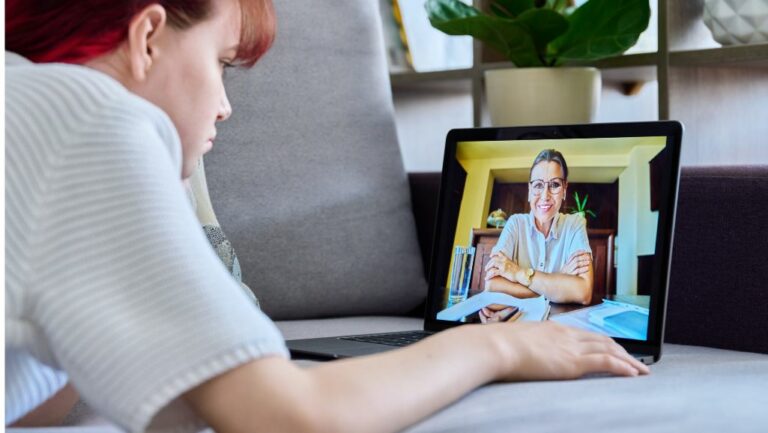 patient using telepsychiatry companies on tablet