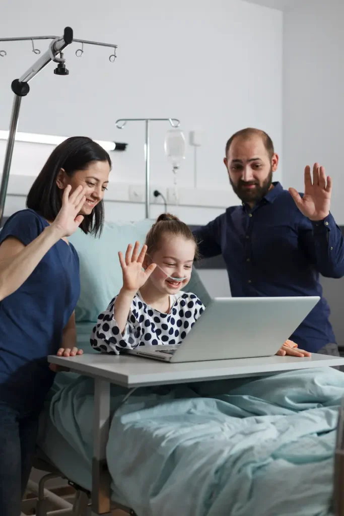 picture of a child in the hospital speaking with their online psychiatrist
