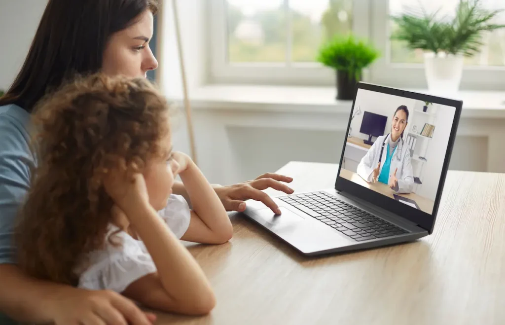 Child attending a session with a child psychiatrist via FasPsych